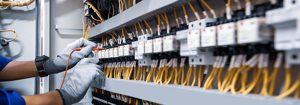 IT support specialist installing cables